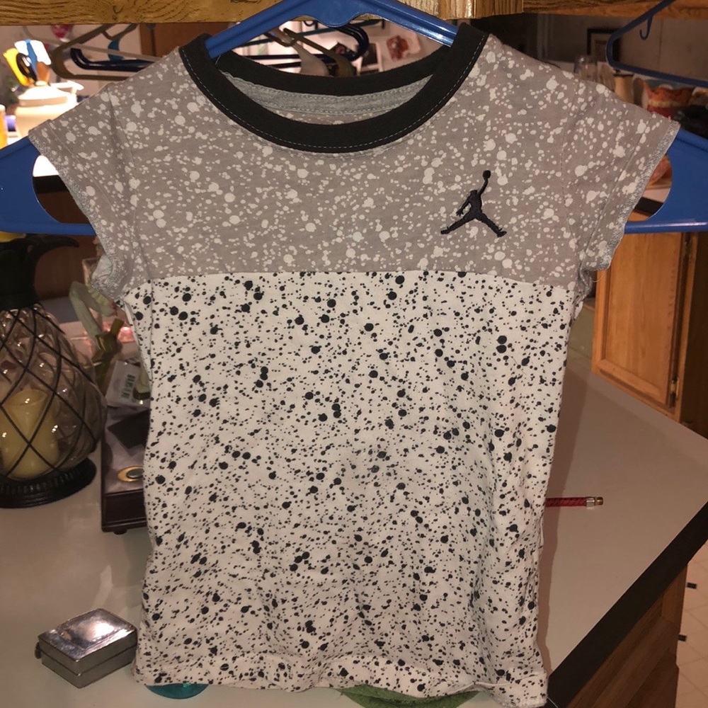 4/$35 Children’s jordan shirt. Size (4) in kids.